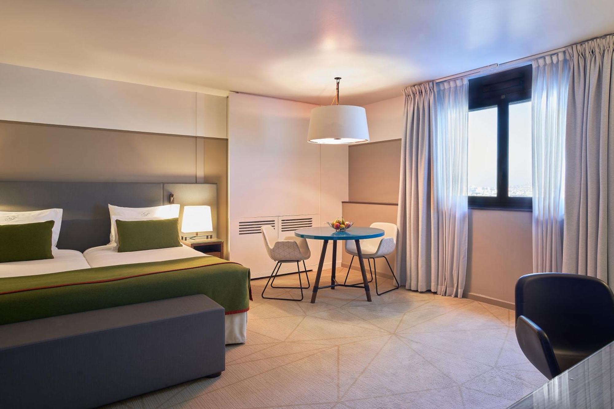 Fraser Suites Paris La Defense Курбевуа Экстерьер фото A room at the hotel