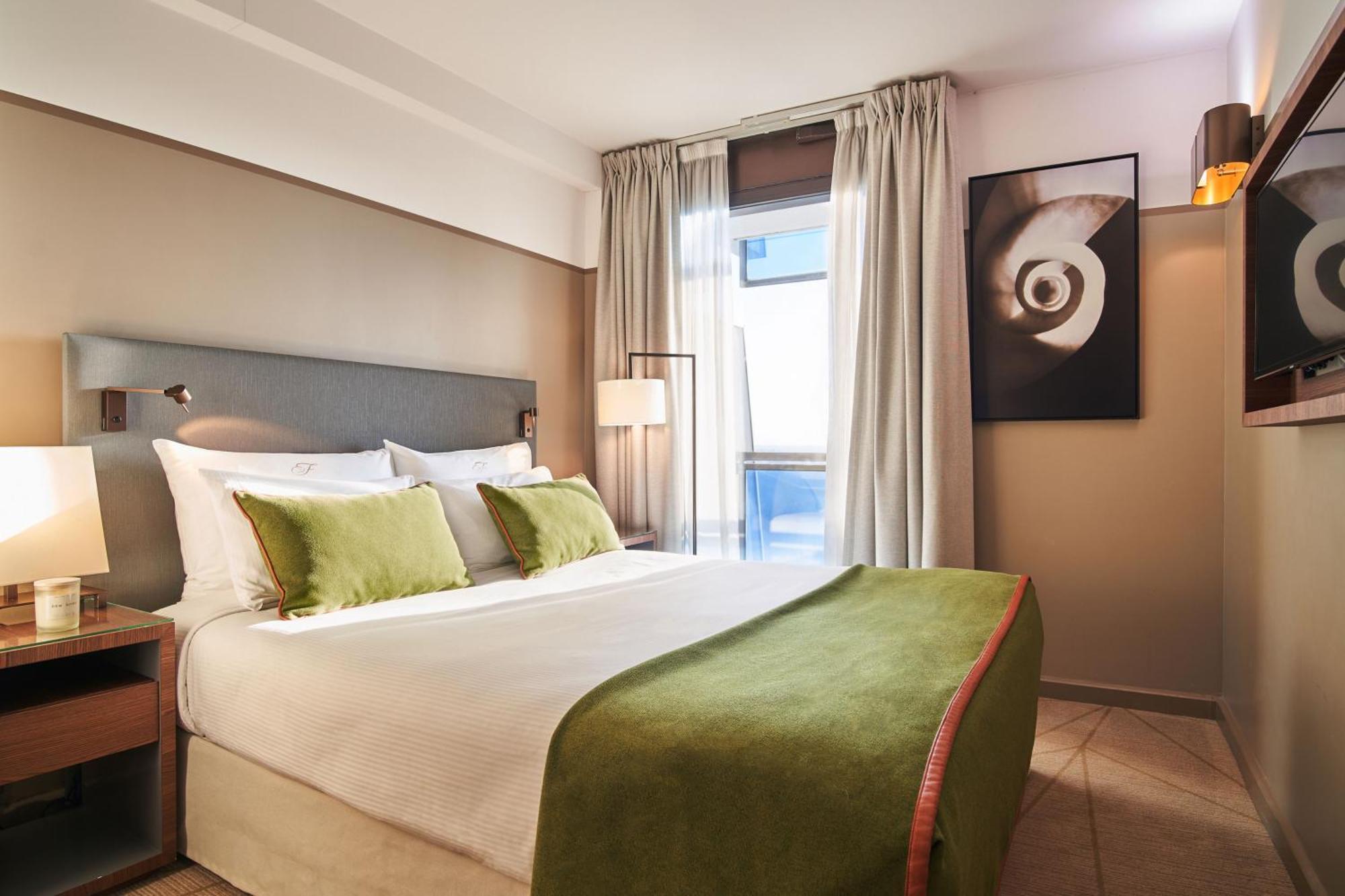 Fraser Suites Paris La Defense Курбевуа Экстерьер фото A bedroom at the hotel