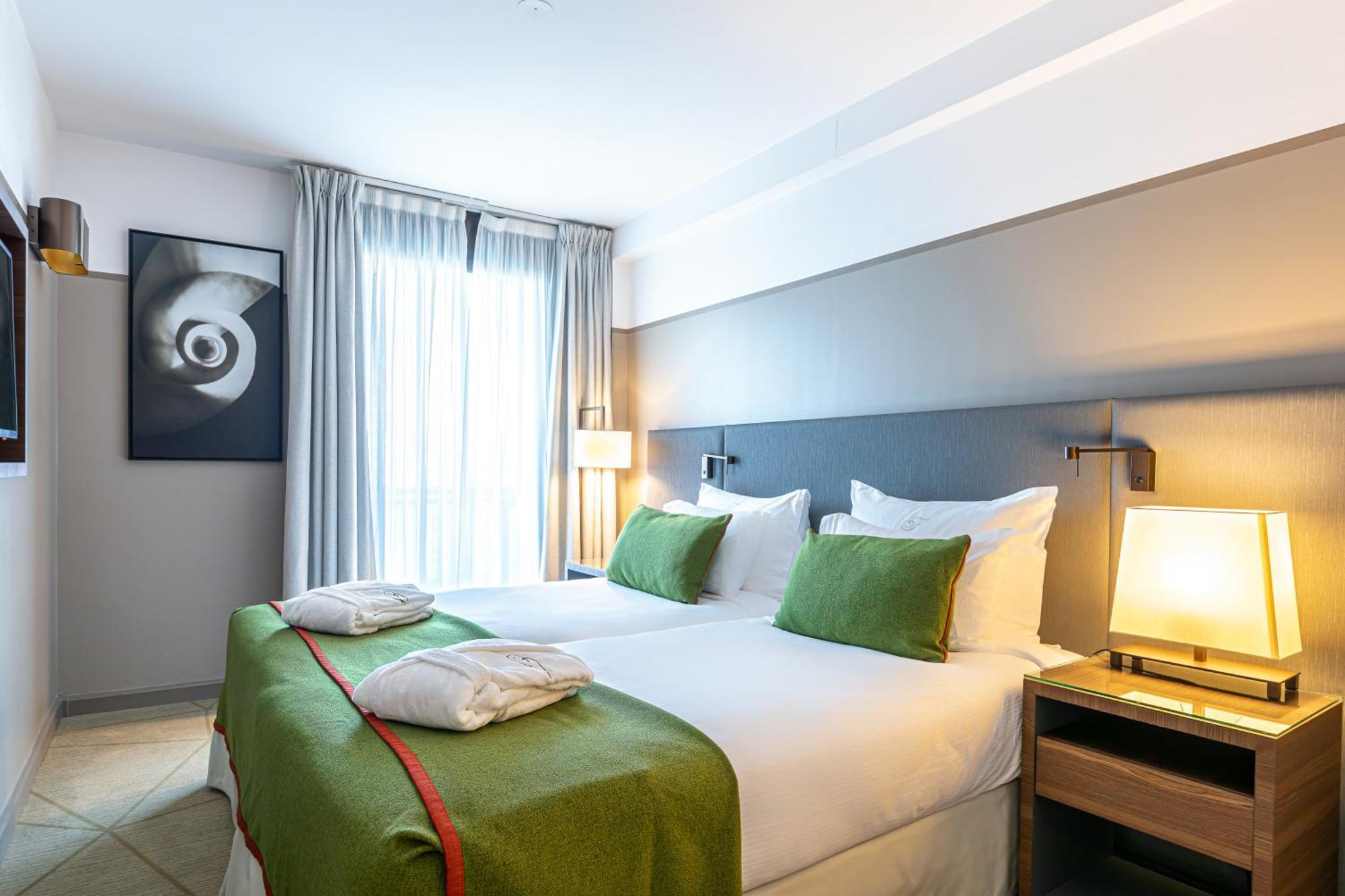 Fraser Suites Paris La Defense Курбевуа Экстерьер фото A room at the hotel