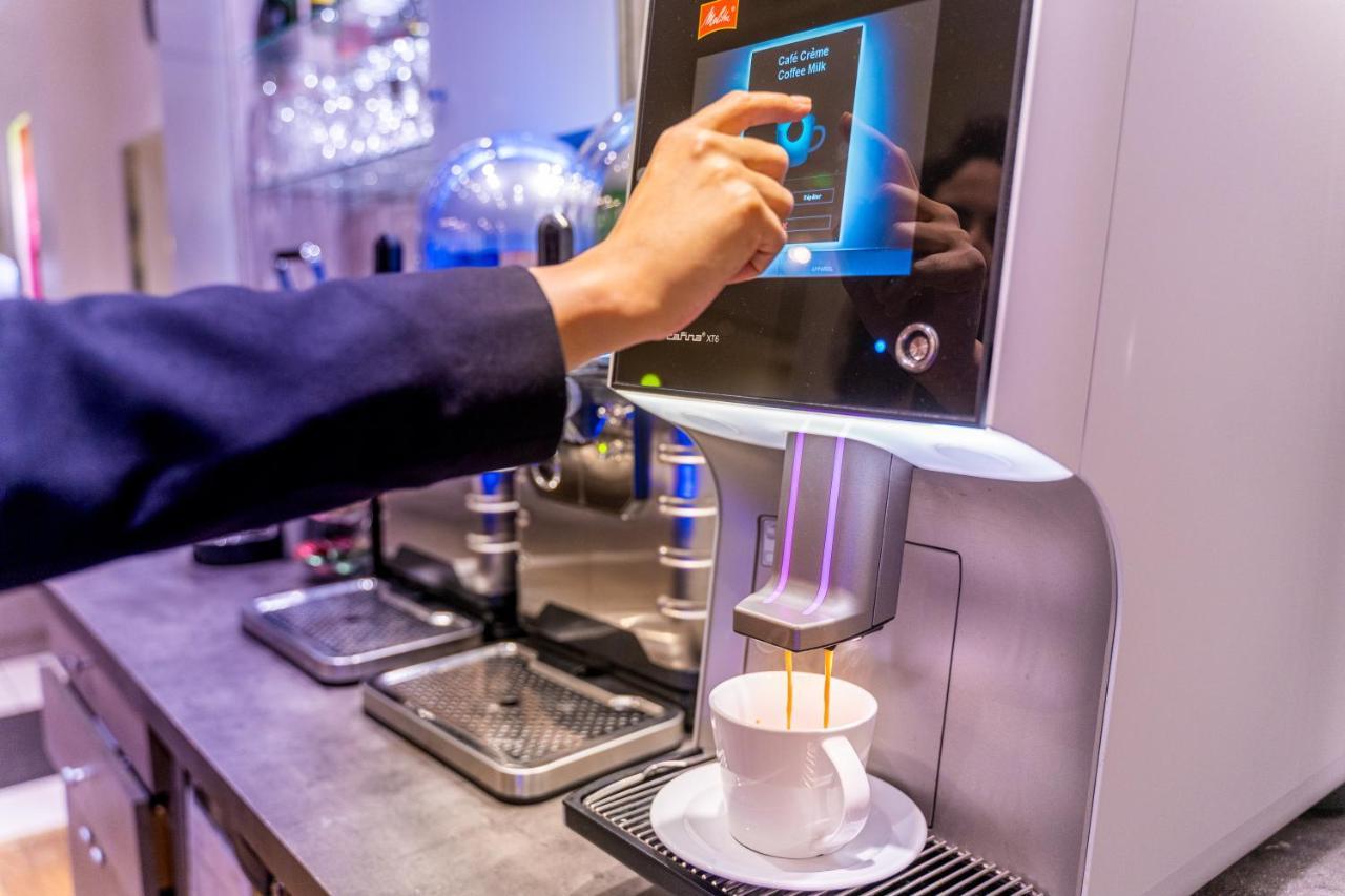 Fraser Suites Paris La Defense Курбевуа Экстерьер фото A coffee machine